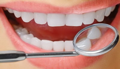牙齿根管治疗的地方出现黑点(牙齿根管治疗能吃面条吗)