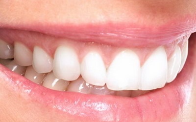 好多牙齿松动怎么办_喝百香果对牙齿有害吗